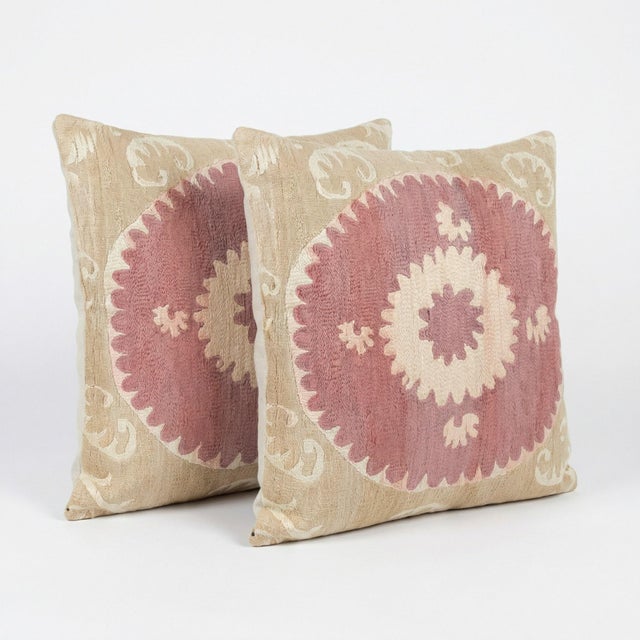 This beautiful 24'' x 25'' hand-embroidered Suzani pillow cover set was made from authentic Uzbek cotton fabric. The...