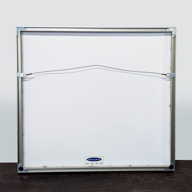 This is a framed minimalist Japanese-inspired print featuring elegant white wave patterns on silk paper. The print is...