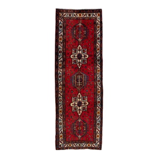 Vintage Heriz Red Handmade Wool Rug With Tribal Motif For Sale