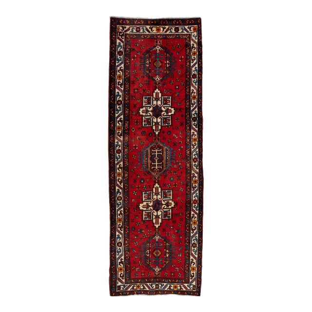 Vintage Heriz Red Handmade Wool Rug With Tribal Motif For Sale