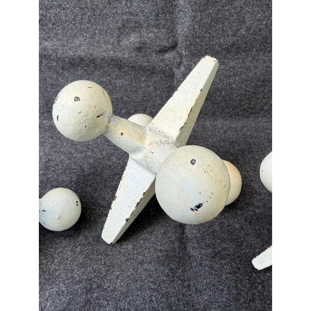 This is a set of three vintage cast iron jacks bookends. One large and two smaller. The smaller pieces can be used as...