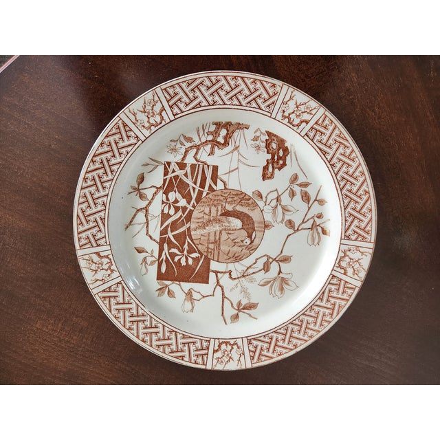 The Antique Mintons 10" Faison Pheasant Dinner Plate is a luxurious and collectible piece of dinnerware from England. Made...