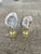 Organic modern nature’s beauty agate geode slices mounted on pronged brass bases as lamp finials.