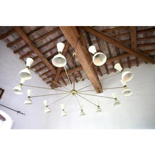 Twelve Arms Natural Patina Brass Chandelier by Angelo Lelli For Sale - Image 12 of 13
