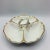 Beautiful white with gold trim and scallop gold inset. Has three divides with an Acanthus leaf design in relief. Mark on...
