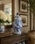A classic blue and white ginger jar, decorated throughout with delicate bird and flowering branch motifs. The pattern is...