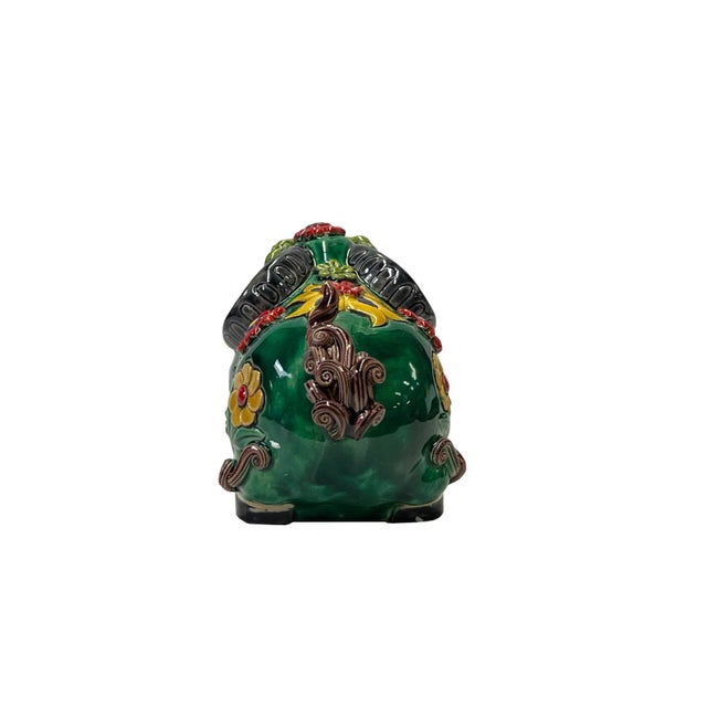 This is an artistic green mix color lucky Ram flower pattern body motif ceramic small animal display figure. Dimension:...