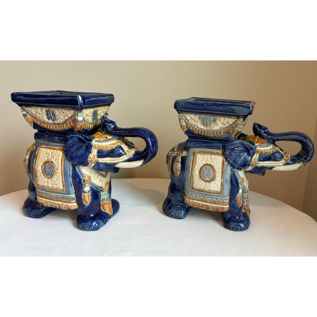 Add a classic Chinoiserie touch to your home with this striking pair of vintage Asian glazed ceramic elephant plant...