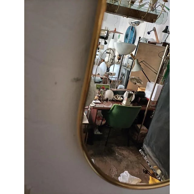 Mid-Century Modern Mirror with Brass Frame in the Shape of a Banana For Sale - Image 3 of 8