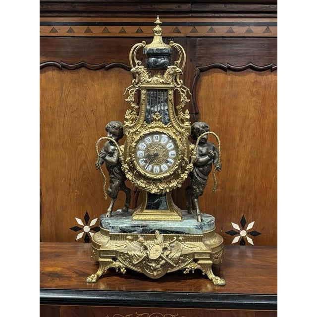 HUGE Brass & Bronze Clock. Chimes On A Bell. Very Impressive Indeed . Sizes :- 61.5 cms tall, 35 cms wide, 20 cms depth....