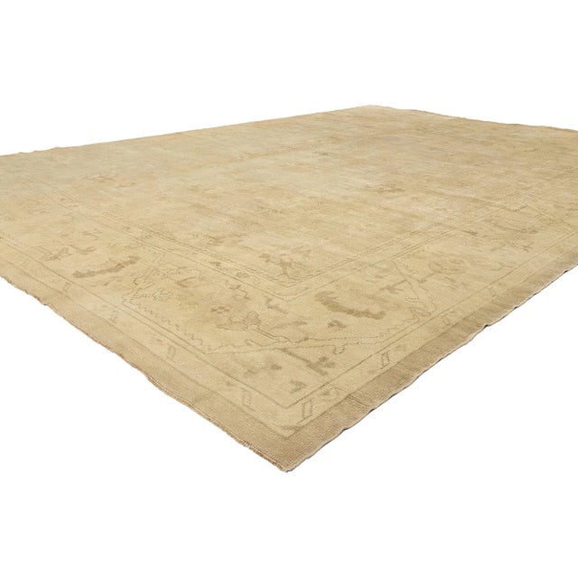 50742 Vintage Modern Earth-Tone Turkish Oushak Rug, 11'00 x 15'04. Steeped in the age-old artistry of Anatolian weaving...