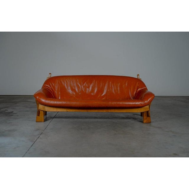 The sofa is in good condition with some traces of usage. w 200 x d 90 x h 83 x sh 40 cm