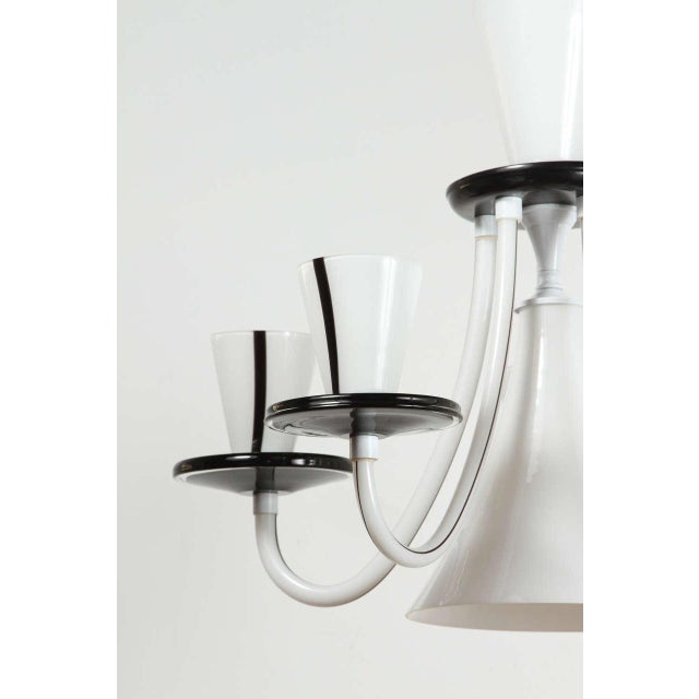This whimsical Murano fixture has been newly rewired for one standard bulb and five candelabra bulbs.