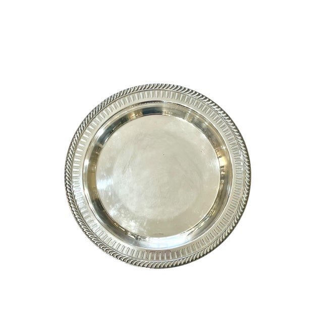 Such a useful piece! Hard to find vintage silver plate lazy Susan. Perfect for styling a coffee table or center of a...
