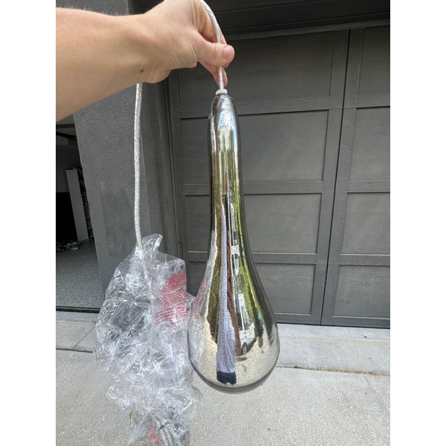 Purchased for 525 new inbox Add silvery shimmer and organic curves to a modern lighting scheme with the Arteriors Arianna...