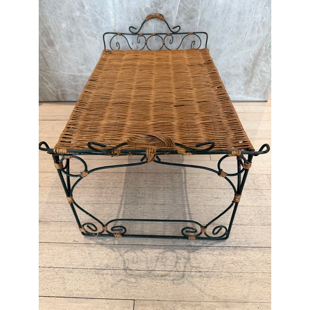 Vintage scrolled style wrought iron verdigris finish and woven rattan bed table.