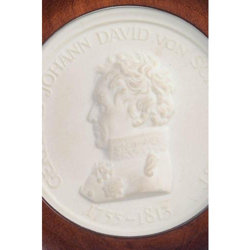 Meissen Biscuit plaque, c. 1970s. Circular relief plaque in white biscuit porcelain with a classical profile portrait and...