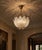 Carl Fagerlund, Orrefors, Swedish Mid-Century Modern, Tulip Chandelier or Pendant Light, Molded Glass, Brass, Sweden,...