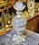 This brass and crystal candlestick holder is a refined decorative accent designed to elevate luxury interiors. Featuring a...