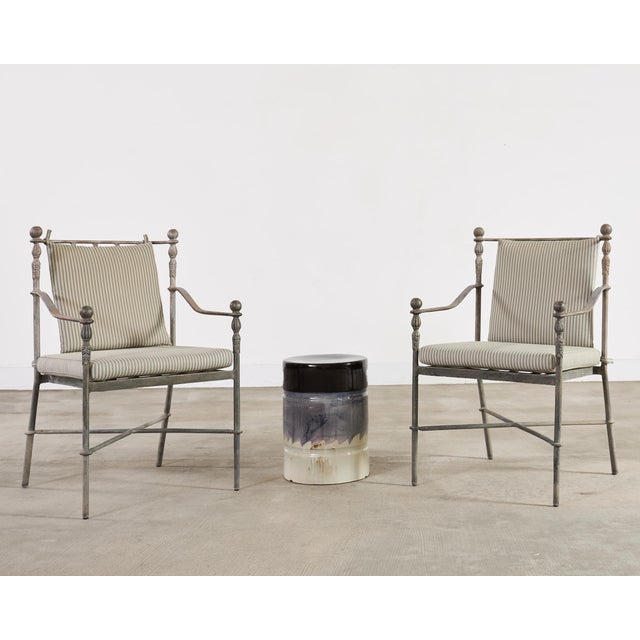 Distinctive set of four Michael Taylor designs Montecito dining armchairs (model #MTD-1078) featuring an intentionally...