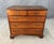This 18th century solid mahogany chest features a classic two-over-three drawer configuration with richly aged patina and...