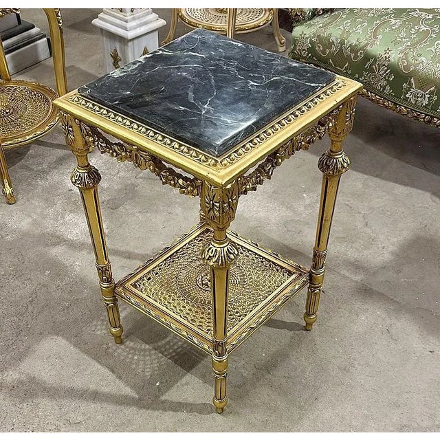 In love with the design. Beautiful side table with gold details. This table can be used for decoration in the hallway or...