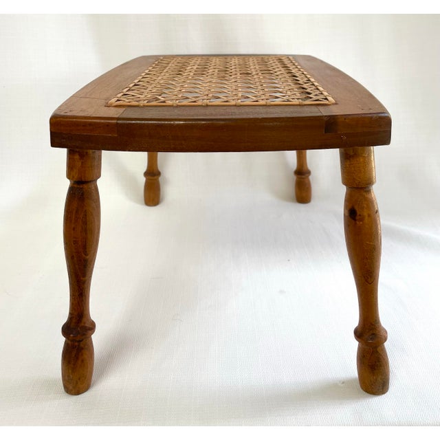 This lovely delicate looking fireside stool belies its sturdy construction. It features a cane seat which was redone in...