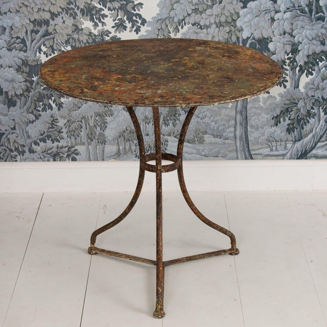 A 19th c. French metal guéridon (round side table) with a gorgeous original patina.
