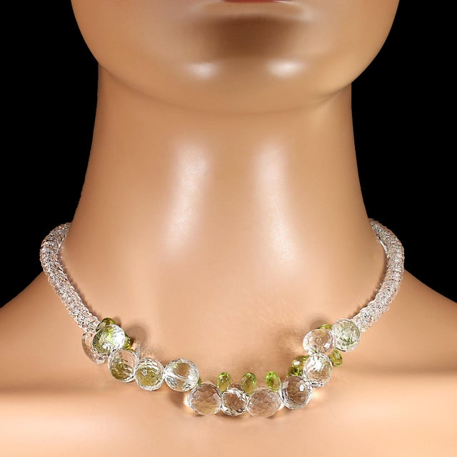 This exquisite 17‑inch necklace is a captivating blend of sparkle, color, and refined craftsmanship. At its heart are...