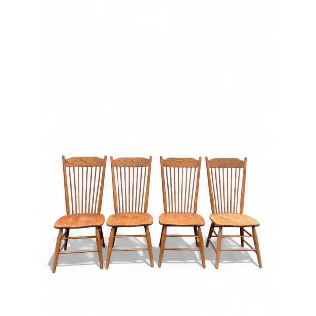 This beautiful set of four dining chairs was made by Virginia House, known for their high-quality American craftsmanship....