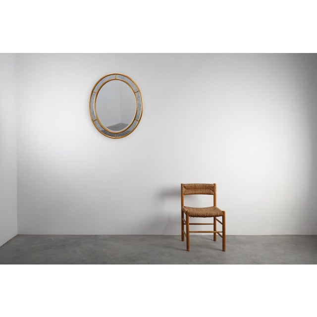 A beautifully preserved example of Belgian decorative design, this gilt mirror by Deknudt captures the refined glamour and...