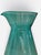 A striking turquoise mold blown modern water carafe. Dimensions are 8’ tall by 5.5’ wide at the base. Mint condition....