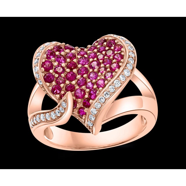 A classic, Cocktail ring 2 Ct Ruby & 0.75 Ct Diamond 18 Karat Rose Gold Heart Shape Ring Ruby approximately 2 ct Diamonds...