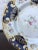 Genuine antique Ironstone China luncheon plate constructed in England in the mid-1800's. Five deep blue motifs are spread...