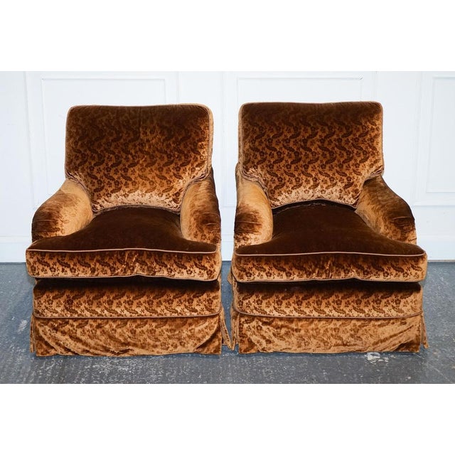 Vintage Pair Of Custom-made Connaught armchairs. The epitome of bespoke comfort and timeless elegance, crafted by the...