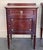 A 19th century French Louis XVI style mahogany side tables, or nightstands, with a fine crest that you can remove. One...