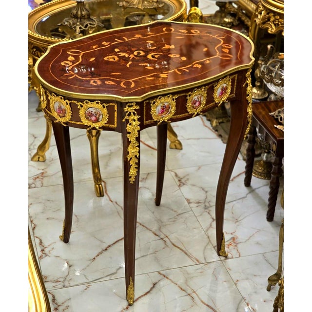 Create memories in a space that reflects your personality. This beautiful French-style coffee table features a rich brown...