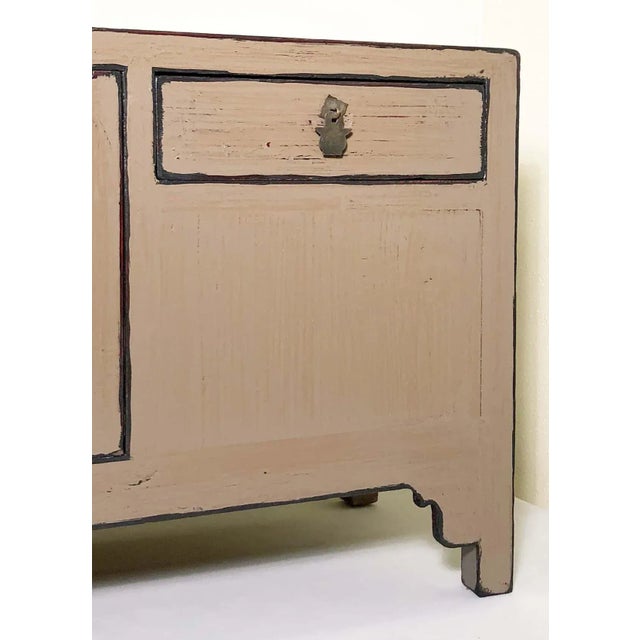 This antique Chinese Petit Ming Cabinet is from the early 19th century. The cabinet is handcrafted in a simple yet elegant...