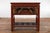 A Chinese red lacquered console table from the 20th century made with 19th century carved pieces, with very unusual hand...