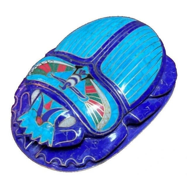 Description Experience the mystic allure of Ancient Egypt with this handcrafted Pharaonic Scarab, a timeless symbol of...