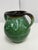 Design Plus Gallery presents a Vintage Signed Hungarian Folk Art Double-Handled Pottery Vessel. This glazed ceramic vessel...
