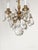 Offered for your consideration is an Antique 4 Arm 4 Light Glowing Graceful Brass Cut Lead Glass Crystal Chandelier. The...