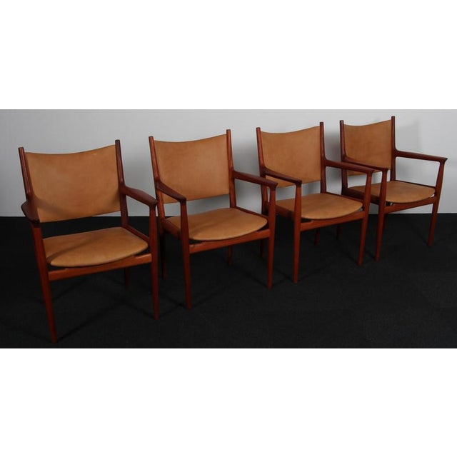 Hans J. Wegner armchair new upholstered with cognac aniline leather. Made of solid mahogany. Model JH513, made by Johannes...