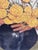 A Seated Indigenous Figure Holding a Large Cluster of Yellow flowers.Artist: Héctor Decont (Mexican, 20th Century) For Sale - Image 11 of 11
