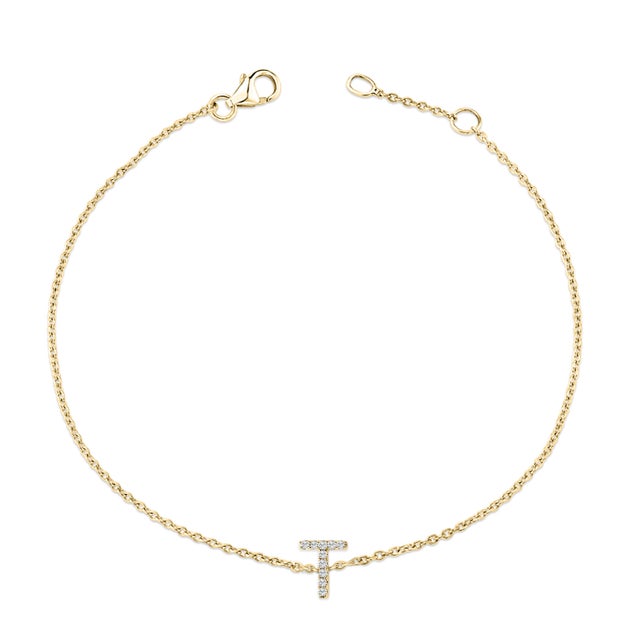Immerse yourself in the understated elegance of this 10K yellow gold bracelet, for an enrapturing shimmer that captures...