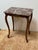Design Plus Gallery presents an Antique French Accent Table. Theatrical for a small piece the Louis XV style accent table...