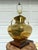 Add a touch of timeless warmth and regal sophistication to your home with this beautiful vintage brass urn table lamp....