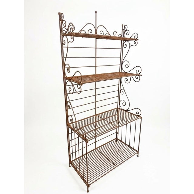 This piece was purchased from an old Farmhouse in Hudson NY area.Classic Bakers rack Style with even oxidation on surfaces...