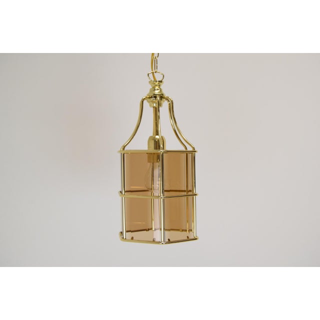 Made in czechoslovakia made of smoked glass, brass 1 x 60 w, e27 or e26bulb us wiring compatible good original condition....