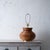 A pencil reed coiled table lamp in the manner of Crespi, 1970s. 14 ¾ inches wide 25 inches tall; 12 inches to top of reeds